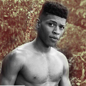 Black and white photo of Hakeem Lyon with leaves in the background